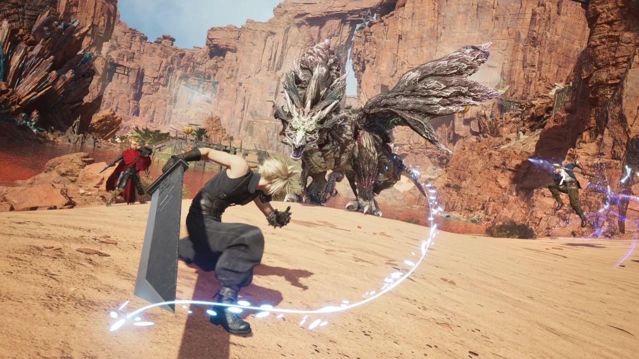 ファイナルファンタジーVII リベレーションで巨大なドラゴン型モンスターと対峙するクラウドと仲間たちの砂漠での戦闘シーン